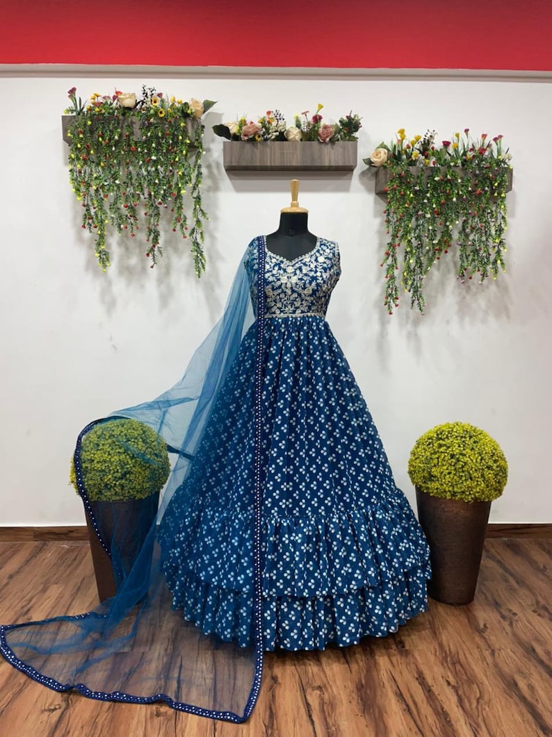 Attractive Georgette Gown With Embroidery Work And Net Dupatta In This Beautiful Long Dress For Women