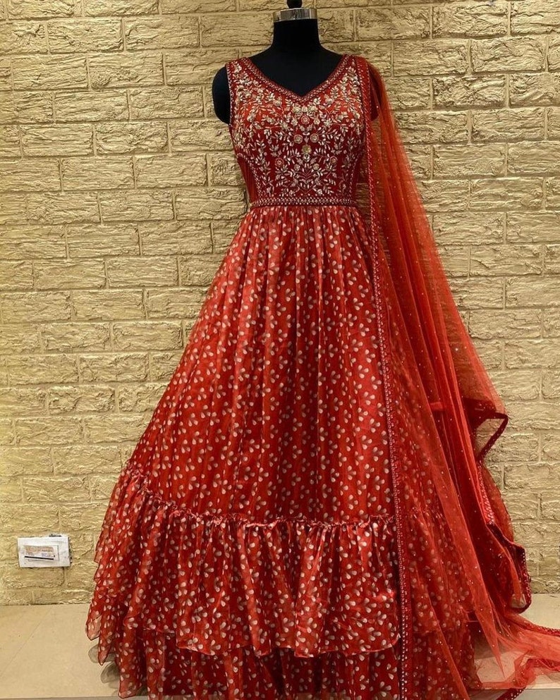 Attractive Georgette Gown With Embroidery Work And Net Dupatta In This Beautiful Long Dress For Women