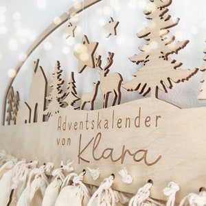 Adventskalender Kinder personalisiert aus Holz mit Anhänger und Säckchen von 1-24 Bild 4