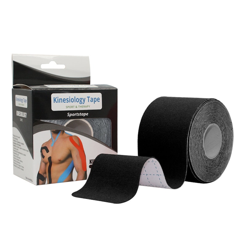 May include: Black kinesiology tape roll with a white label that reads "Kinesiology Tape Sport & Therapy Sports Tape". The tape is rolled up and a portion of the tape is unrolled, showing the black, textured surface.