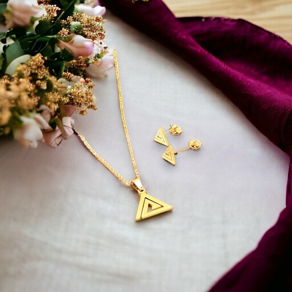 Triangle set with spiral pendant and gold stainless steel earrings.