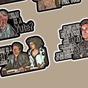 May include: A set of six stickers featuring quotes from the movie "My Cousin Vinny". The stickers feature different characters from the movie, including Vinny Gambini, Mona Lisa Vito, and the judge. The quotes on the stickers include "What is a Yute?", "What is a Grit Anywayst?", "And let me see, what else can we pile on? Is there any more Shit? We can pile on to the top of the outcome of this case!", and "Is it possible?"