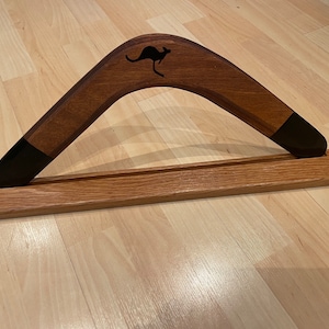 BOOMRANGS Boomerang stand made from solid oak (Boomerang not included) also available in vintage Ash wood & various stains. Ask for details