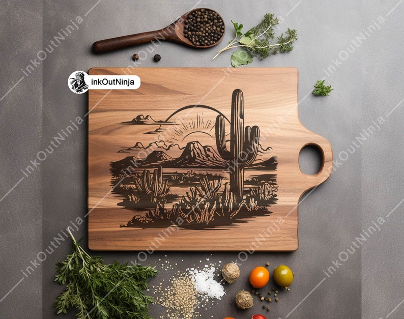 May include: A wooden cutting board with a laser-engraved design of a desert landscape with a cactus and a rising sun. The board has a handle on the side.