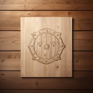 May include: A wooden shield with a carved design, on a wood background.