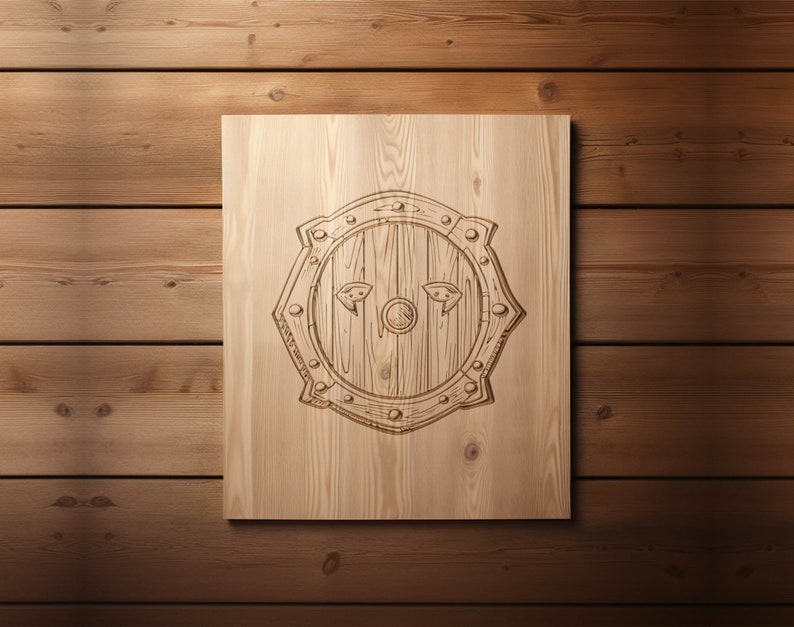 May include: A wooden shield with a carved design, on a wood background.