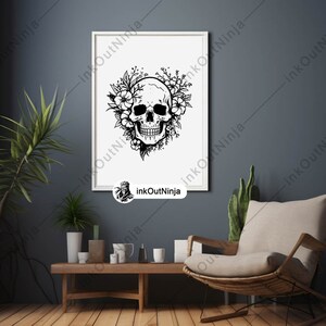 May include: Black and white illustration of a skull with flowers around it. The skull is surrounded by a wreath of flowers, including roses and leaves. The image is on a white background.