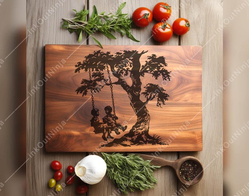 May include: A wooden cutting board with a laser-etched design of a tree with two children swinging on a swing. The board is brown and has a natural wood grain.