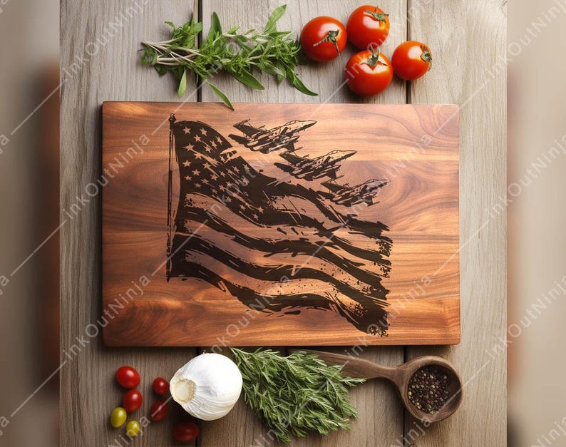 May include: A wooden cutting board with a distressed American flag design and a group of airplanes flying over the flag. The board is surrounded by green herbs and red tomatoes.