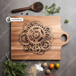 May include: A wooden cutting board with a design of gears engraved on the surface. The board has a handle on the side.