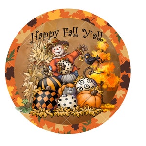 May include: A round, brown and orange fall-themed sign with a scarecrow holding a pumpkin, a black cat, and a bird. The sign says "Happy Fall Y'all".