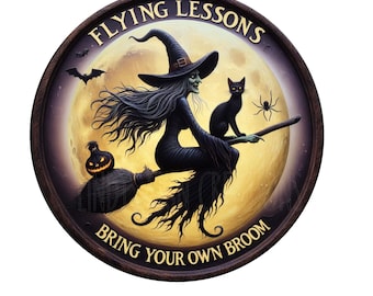 May include: Round wooden sign with a witch riding a broom in front of a full moon. The sign reads "FLYING LESSONS" at the top and "BRING YOUR OWN BROOM" at the bottom. A black cat and a jack-o'-lantern are also featured.