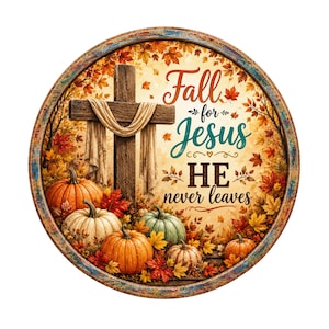 May include: A round decorative sign featuring a wooden cross draped with fabric, surrounded by orange, white, and green pumpkins and autumn leaves. The text reads: Fall for Jesus HE never leaves. The sign has a weathered, rustic-style circular frame.