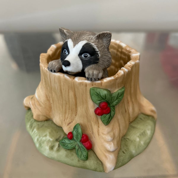 Vintage 1984 porcelain Woodland Surprises, figure "Racoon", showing a Racoon inside  a tree trunk. A collectable Franklin Porcelain group.