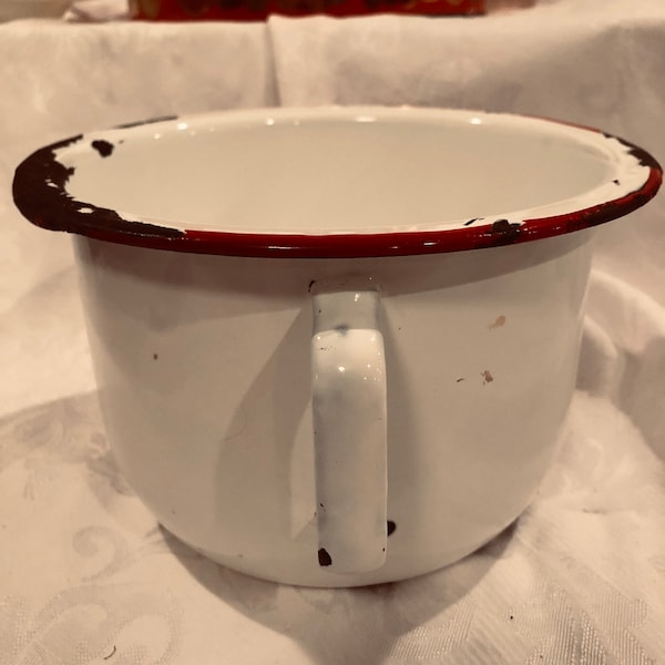 A vintage enamelled stainless steel chamber pot , a Canadian  Prairie homestead  item preowned and looking well used c 1930- 40s Decor Item.
