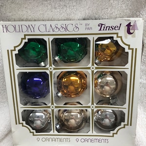 A vintage set of 9 Glass Tinsel Christmas tree ornaments in their original box c1960s preowned and in good condition, Mixed Vintage  Colours