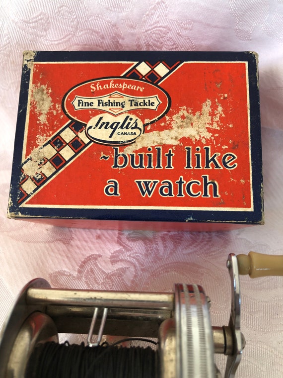 Vintage Shakespeare Level Winding Reel Date1956 Toronto by Inglis. Preowned  Good Condition. Original Box a Fantastic Fishing Display Reel. 