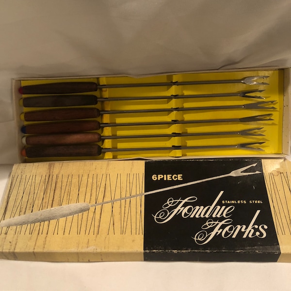 6 Vintage mixed stainless steel fondue forks in a vintage box. Preowned and used, items are in very good condition.