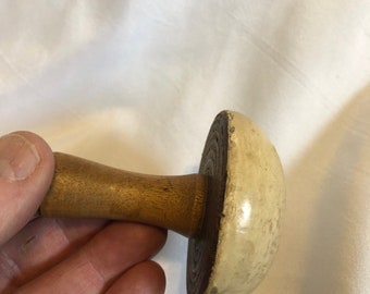 A unique vintage sewing tool, a darning mushroom c 1930 in a fruit wood with  stressed painted top. This is an original vintage sewing tool