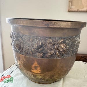 Antique Brass Jardiniere c 1900 made by Beldray & Company England. A punched rose border encircles the Jardiniere also known as a cachepot.