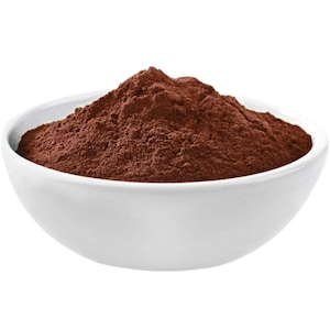 May include: A white bowl filled with a generous amount of dark brown cocoa powder.