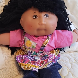 Cabbage Patch Doll Capelli neri... Occhi marroni