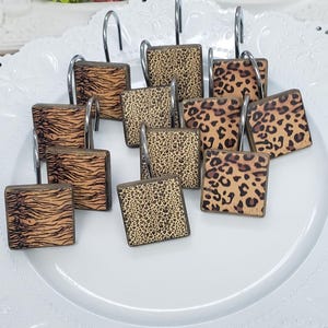 Crochets pour rideaux de douche... Safari