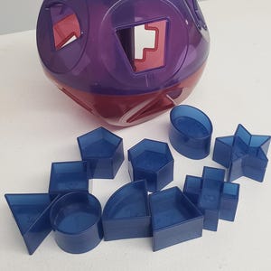 Juguete Tupperware con forma de O