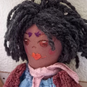 Handmade textile Ragdoll with embroidered face, knit cardigan and frog purse