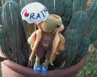 Handmade Crochet Frog Doll: Poseable Plush with Raincoat & Umbrella