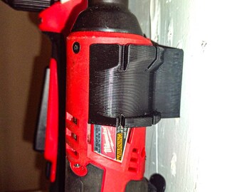 Milwaukee M12 Latching Fuel or Brushed  3/8th Ratchet and Right Angled Drill Mount-Holder With Battery In 12 Volt Fits Pegboard