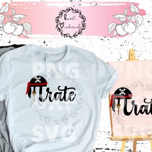 May include: A white t-shirt with a black and red pirate hat and the word "Pirate" written in black cursive. The t-shirt is on a gray surface.