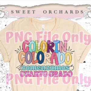 May include: A cream-coloured t-shirt featuring the words "COLORIN COLORADO" in colourful letters, with the text "Comenzamos Cuarto Grado" underneath. The shirt has rolled-up sleeves and a crew neck. The words "PNG File Only" are printed over the image.