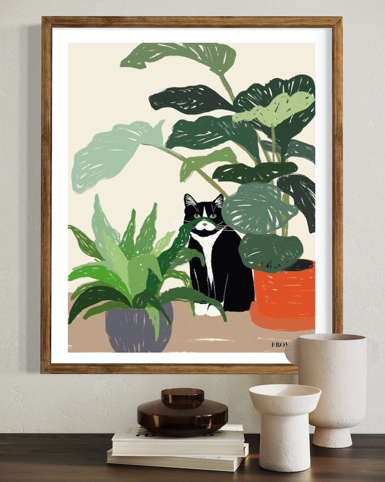 May include: A black and white cat sits in a pot of green plants. The cat is looking at the viewer. The plants are in a brown pot. The background is a light beige color. The text "FROY" is at the bottom of the image.