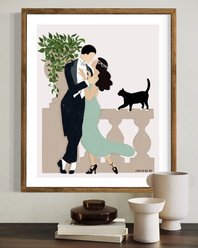 May include: A framed illustration of a couple in formal attire dancing on a balcony. The man is wearing a black tuxedo and the woman is wearing a green dress. A black cat is sitting on the railing of the balcony. The text "FROM RURU" is at the bottom of the illustration.
