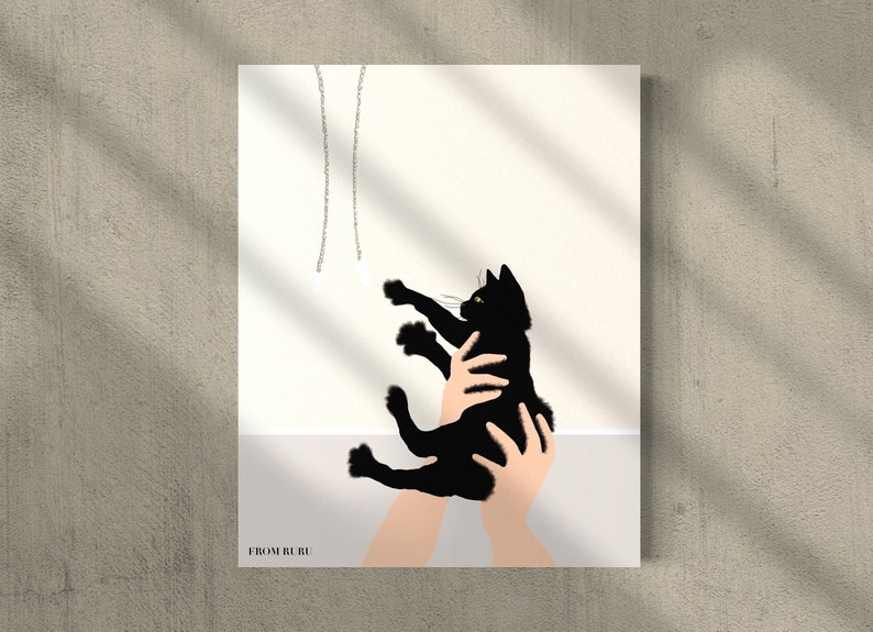 May include: Illustration of a black cat with green eyes reaching for dangling chains. The cat is held by two hands. The artwork is on a white background with shadows and the text "FROM RURU" at the bottom.