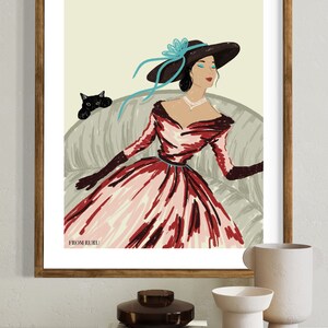 May include: A woman in a red and pink dress with a black hat and a blue flower sits on a couch with a black cat. The text "FROM RURU" is at the bottom of the image.