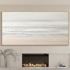 May include: A horizontal abstract painting with a light gray and white background and a subtle peach colored bottom. The painting depicts a seascape with waves and a horizon.