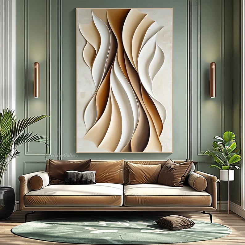 May include: Abstract wall art featuring a 3D design of overlapping, curved shapes in shades of brown, beige, and white. The artwork is displayed on a wall in a living room setting with a sofa and plants.