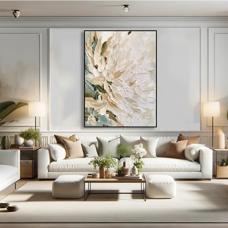 May include: A large rectangular wall art piece featuring an abstract floral painting with thick, textured impasto brushstrokes in shades of cream, white, beige, and muted sage green, framed in a thin black border and displayed on a wall.