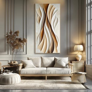 May include: Abstract wall art featuring a modern design with brown and white curved lines. The artwork is framed and hanging on a wall in a living room setting.