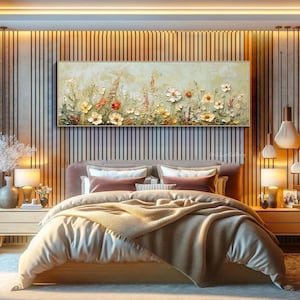 May include: A rectangular floral painting with a gold frame hangs above a bed. The artwork features textured flowers in shades of yellow, orange, and white against a light green background. The bedroom has a wooden accent wall and warm lighting.