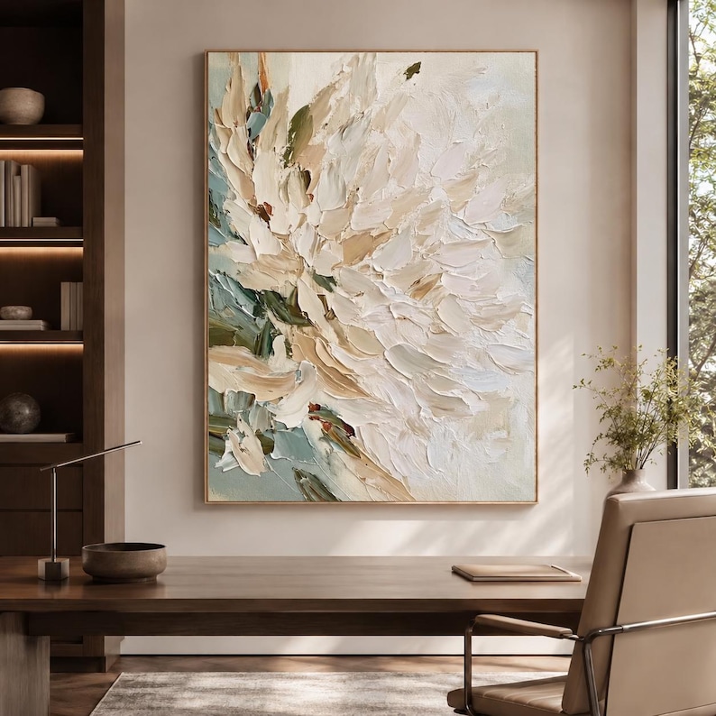 May include: A vertical rectangular canvas painting featuring thick, textured impasto brushstrokes in shades of cream, white, beige, and muted sage green. The abstract composition depicts layered floral petals with a heavy, raised paint application.