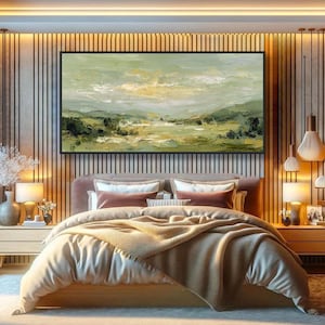 May include: A bedroom scene featuring a large landscape painting above a bed. The painting has a black frame and depicts a green and yellow landscape. The bed has a pink headboard, white bedding, and a tan blanket. Two nightstands with lamps flank the bed.