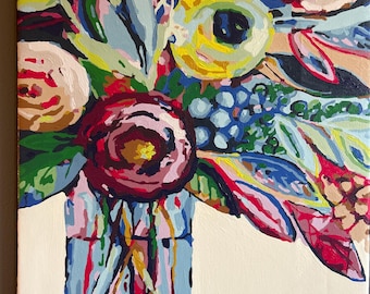May include: A colorful abstract painting of a bouquet of flowers in a vase. The flowers are painted in shades of pink, red, yellow, blue, and green. The vase is painted in shades of blue and white.