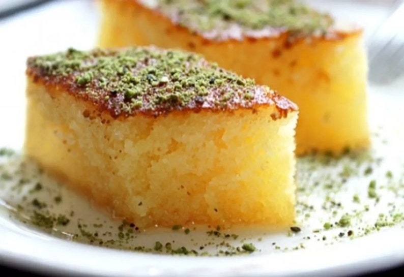 Traditional Delicious Turkish Revani Dessert Semolina Cake with Orange Infused Syrup 