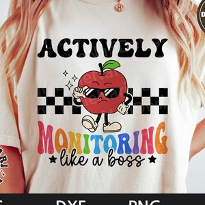 May include: A white t-shirt with the text "ACTIVELY MONITORING like a boss" in rainbow colors. A red apple with sunglasses and arms is standing on a black and white checkered pattern. The text "INCLUDE DISTRESSED PNG" is in a brown box in the upper right corner.
