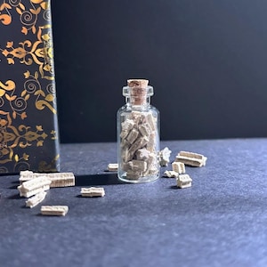 Small Jar of Crinoid Fossils (35 total)