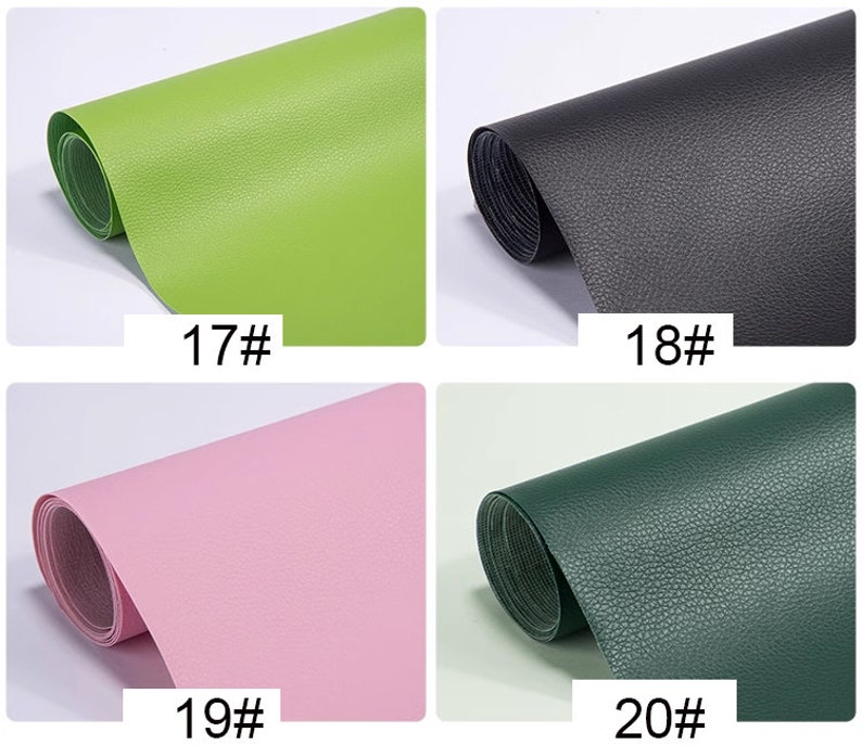 May include: Four samples of faux leather in different colors: green, black, pink, and dark green. Each sample is rolled up and labeled with a number.