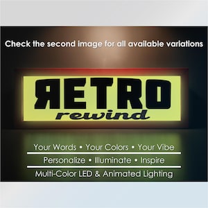 May include: A yellow sign with the text "RETRO rewind" in black letters. The sign is illuminated with multi-color LED lights. The text below the sign reads "Your Words Your Colors Your Vibe Personalize Illuminate Inspire Multi-Color LED & Animated Lighting."